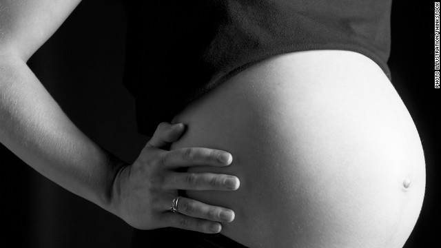 120823094353-black-and-white-pregnant-belly-story-top.jpg