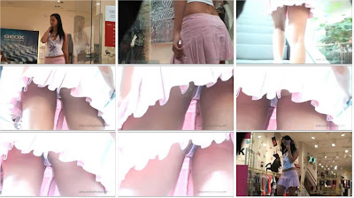 0068+Upskirt+a+linda+chica+en+faldita+rosa+y+tanga+de+encaje+blanco.jpg